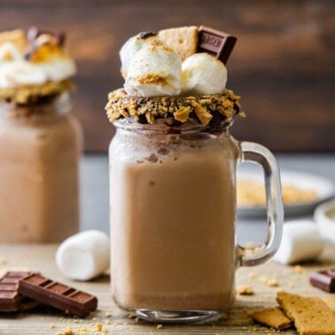A mug of Smores Frappe with another mug in the back ground.