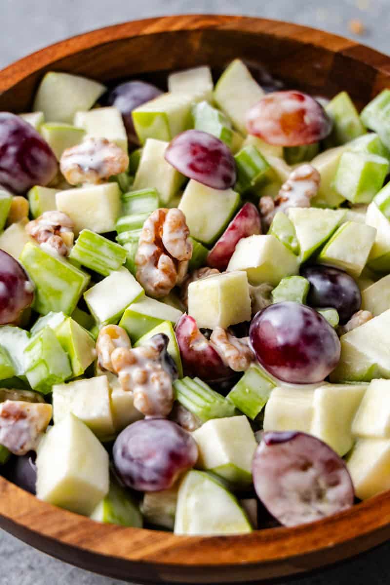 A photo showing the delicious ingredients of in a bowl of made Waldorf Salad.