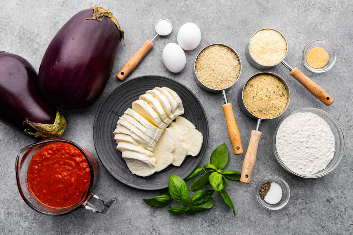 An overhead view of the ingredients needed to make Baked Eggplant Parmesan.