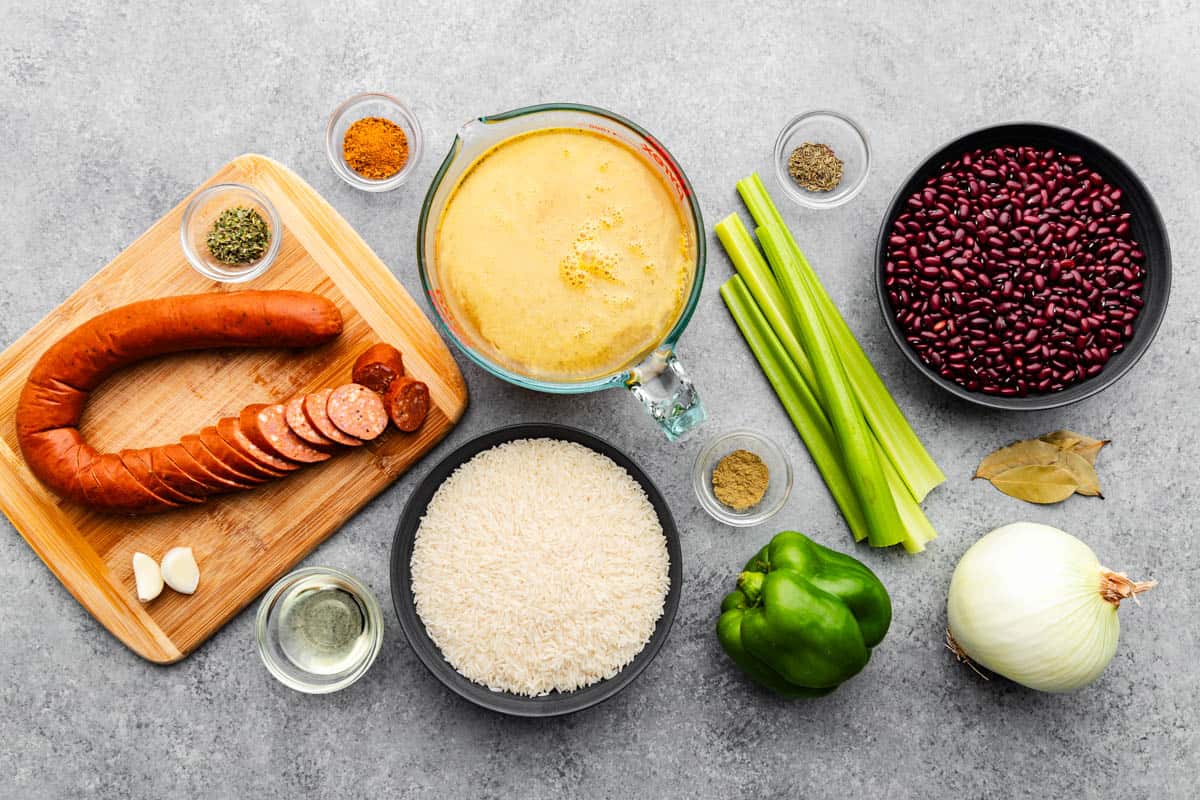 An overhead view of the ingredients needed to make red beans and rice.