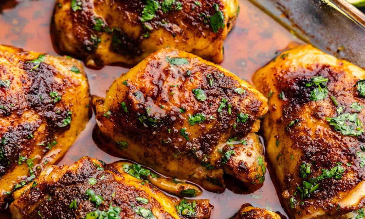 A pan of Mexican Spiced Chicken Thighs in juices.