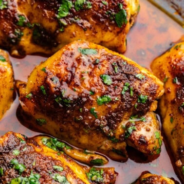 A pan of Mexican Spiced Chicken Thighs in juices.