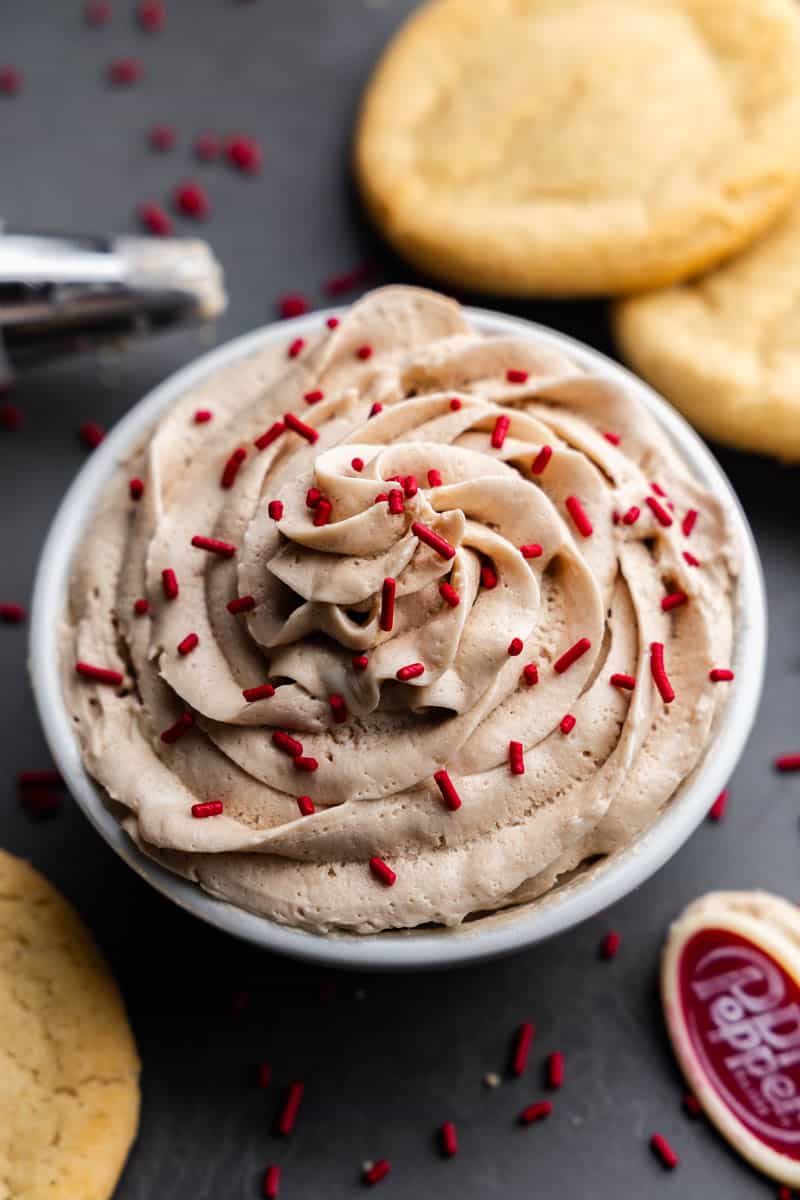 A close up view of a bowl of Dr. Pepper Frosting.