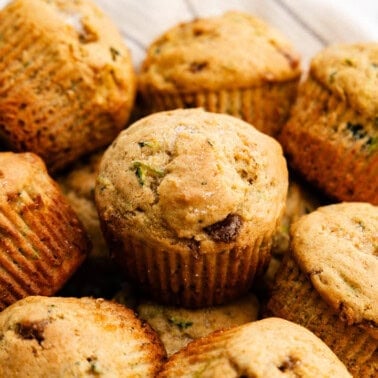 A pile of fluffy zucchini muffins.