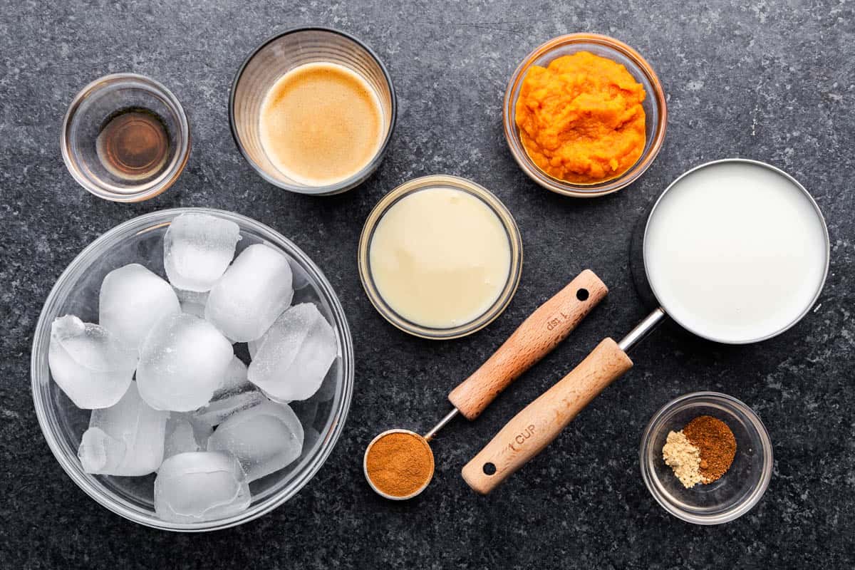 An overhead view of the ingredients needed to make Pumpkin Spice Frappes.