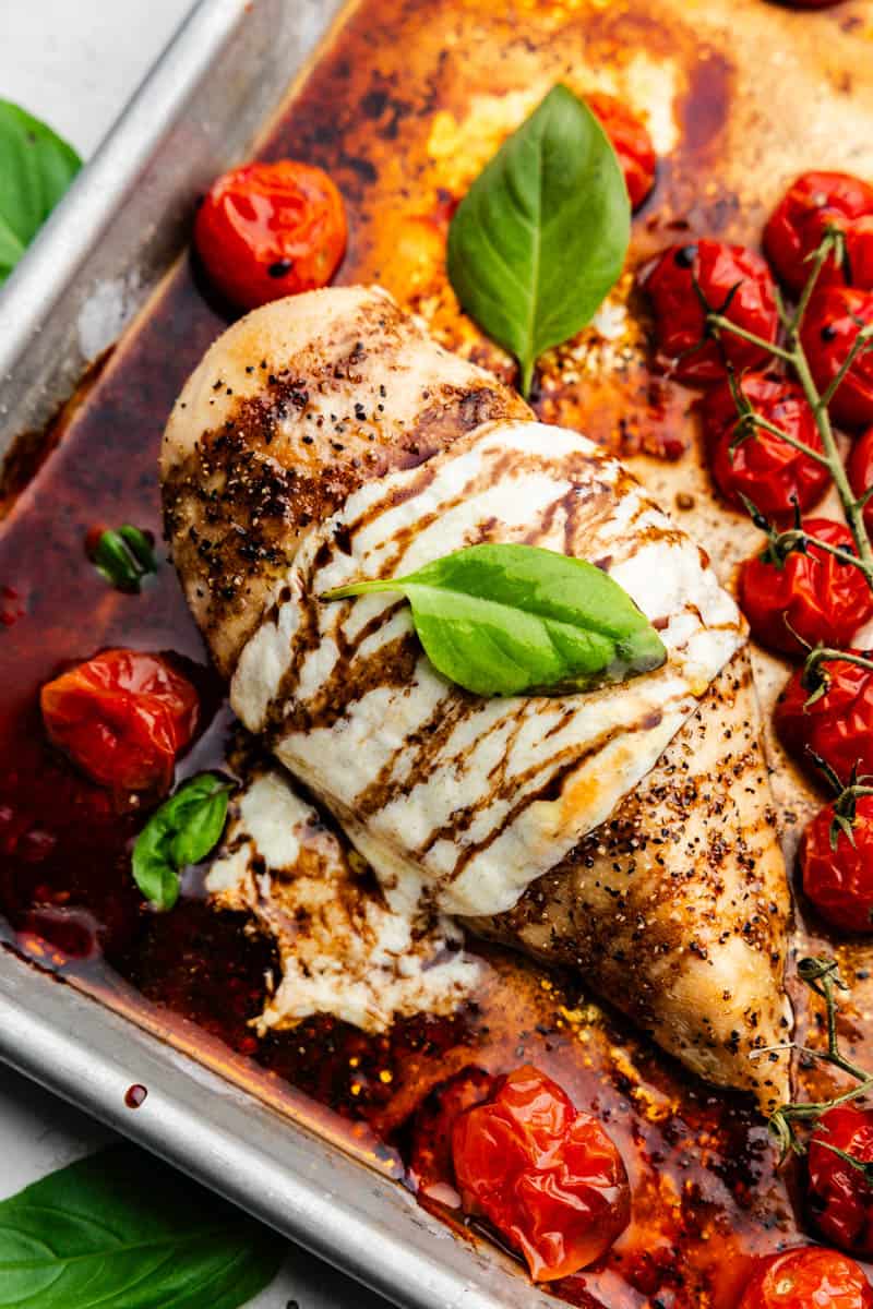 Close up view of sheet pan chicken caprese.