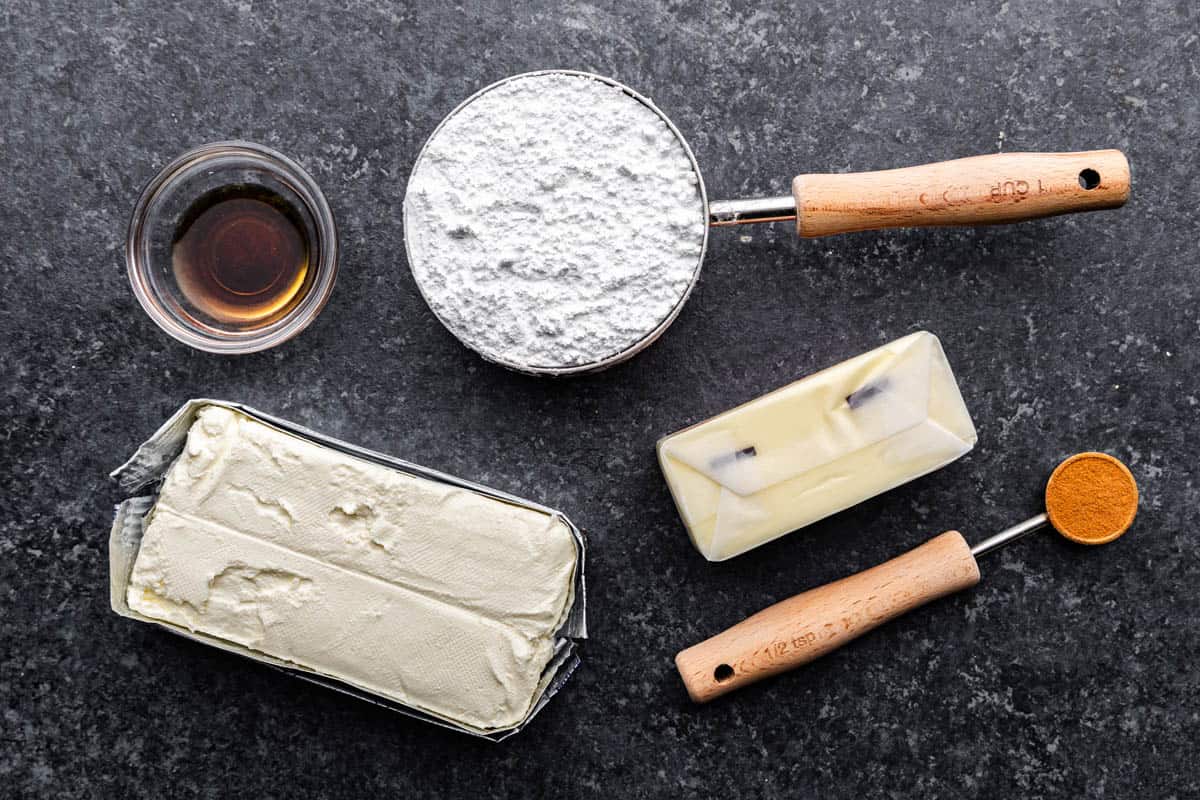 An overhead view of the ingredients needed to make cinnamon cream cheese butter.