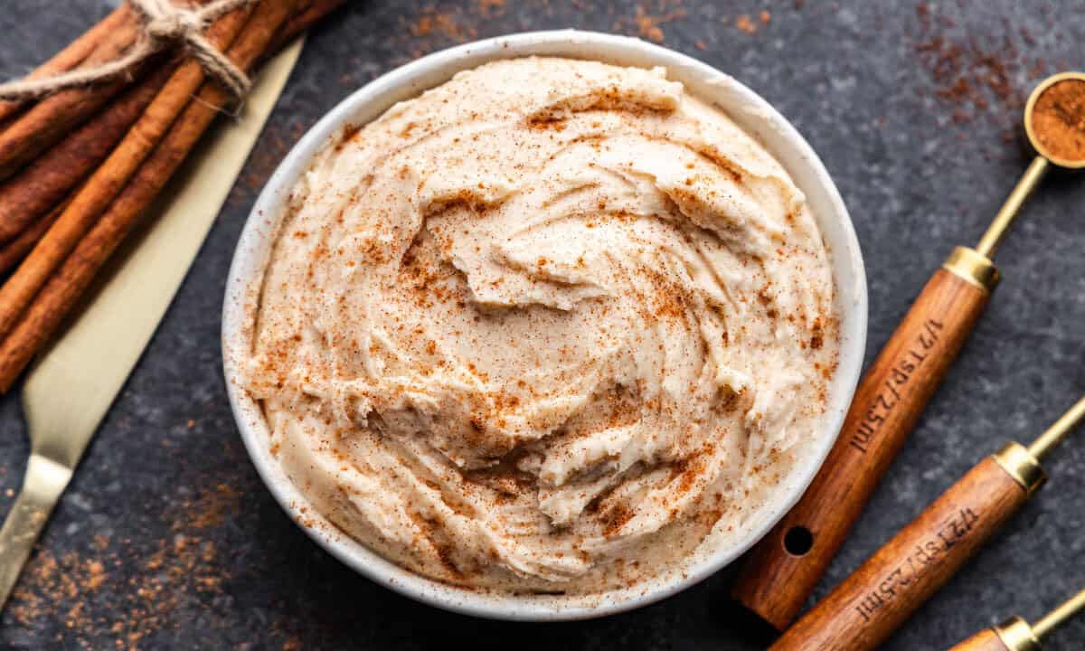 An overhead view of a bowl of cinnamon cream cheese butter.