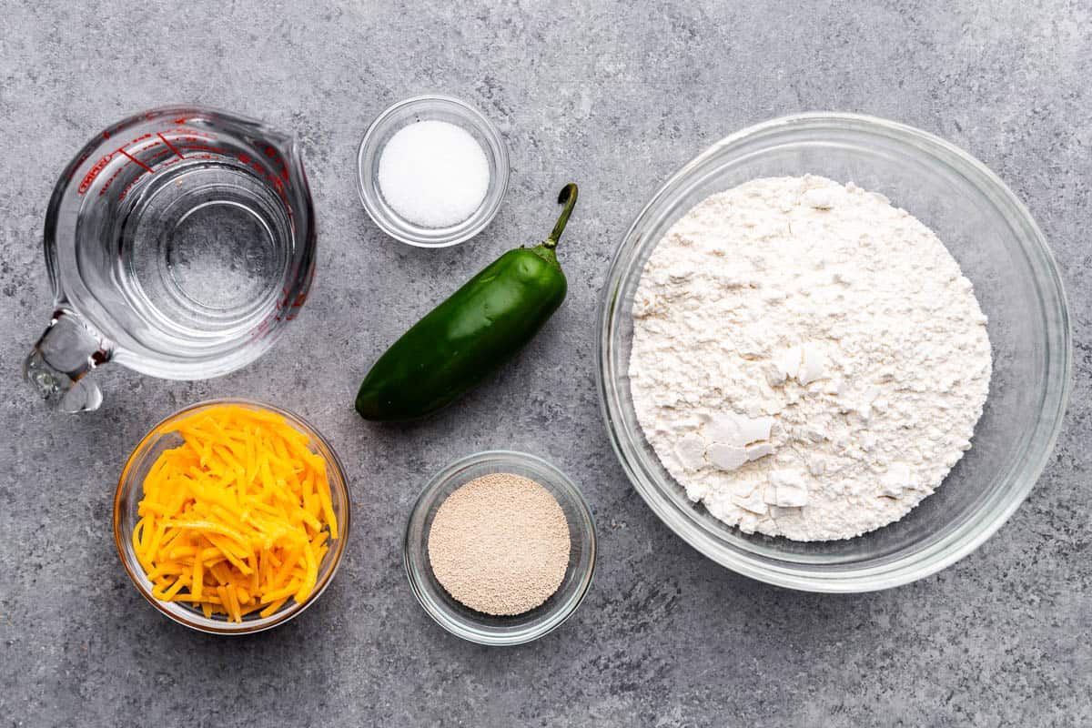 An overhead view of measured ingredients to make jalapeno cheese bread.