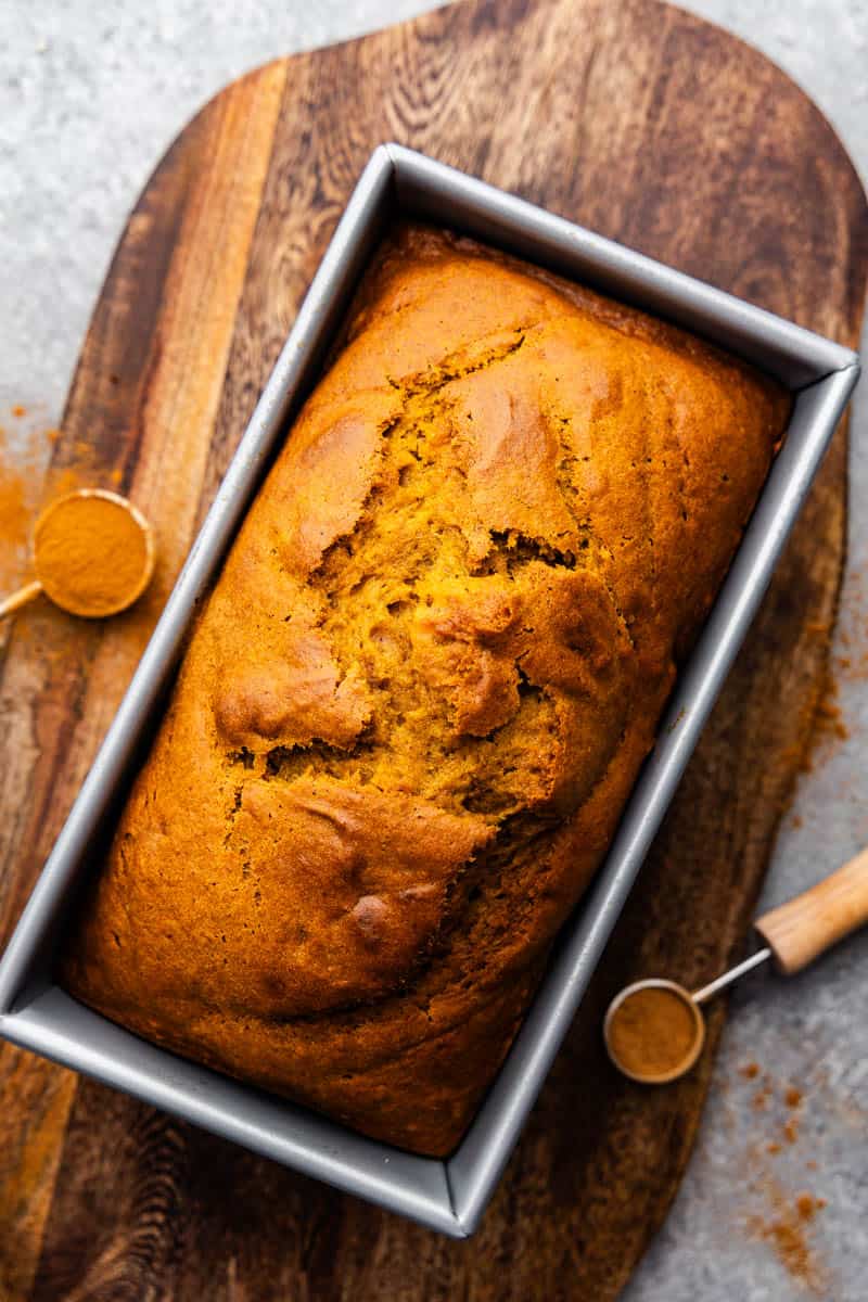 An overhead view of pumpkin bread still in the pan.