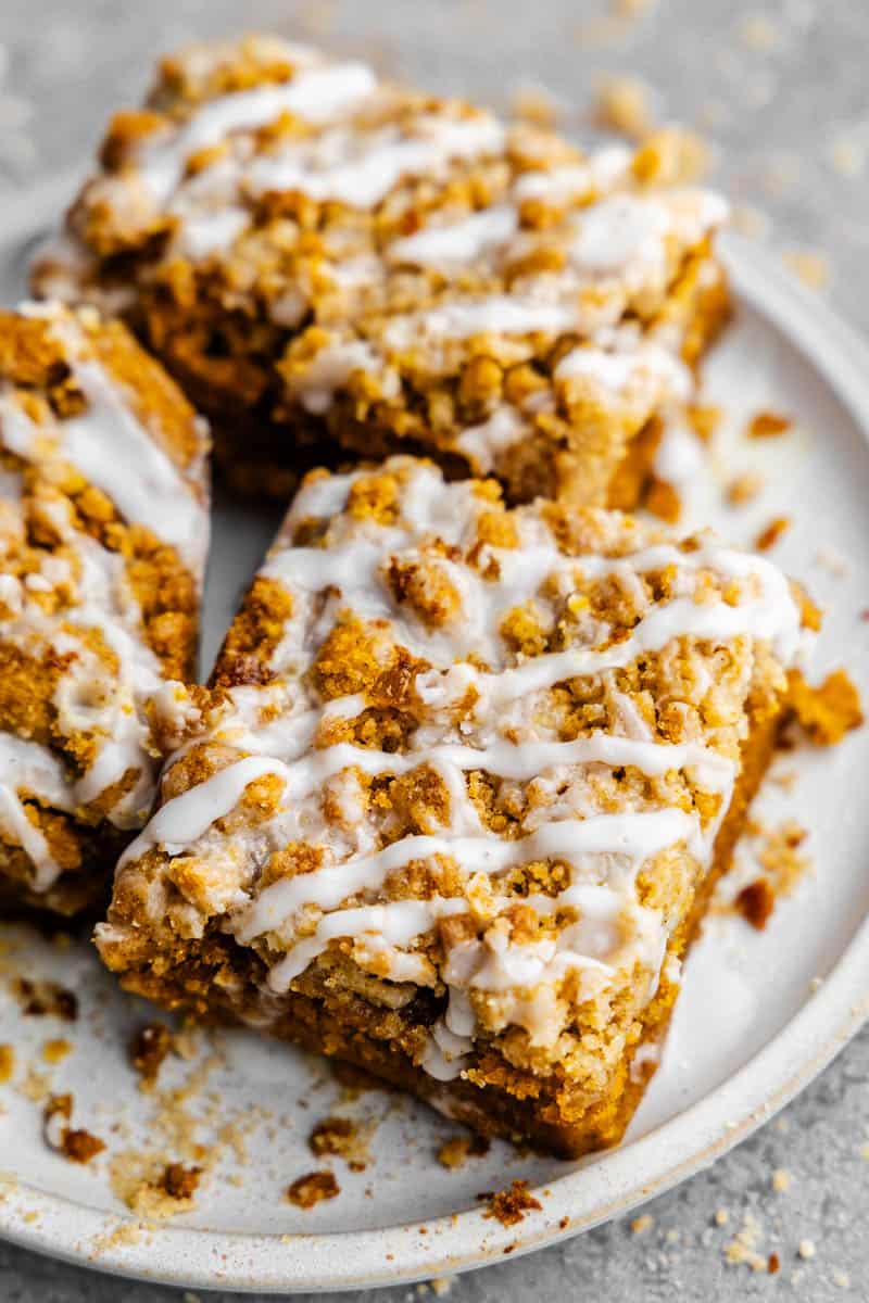 A plate of slices of pumpkin crumb cake.