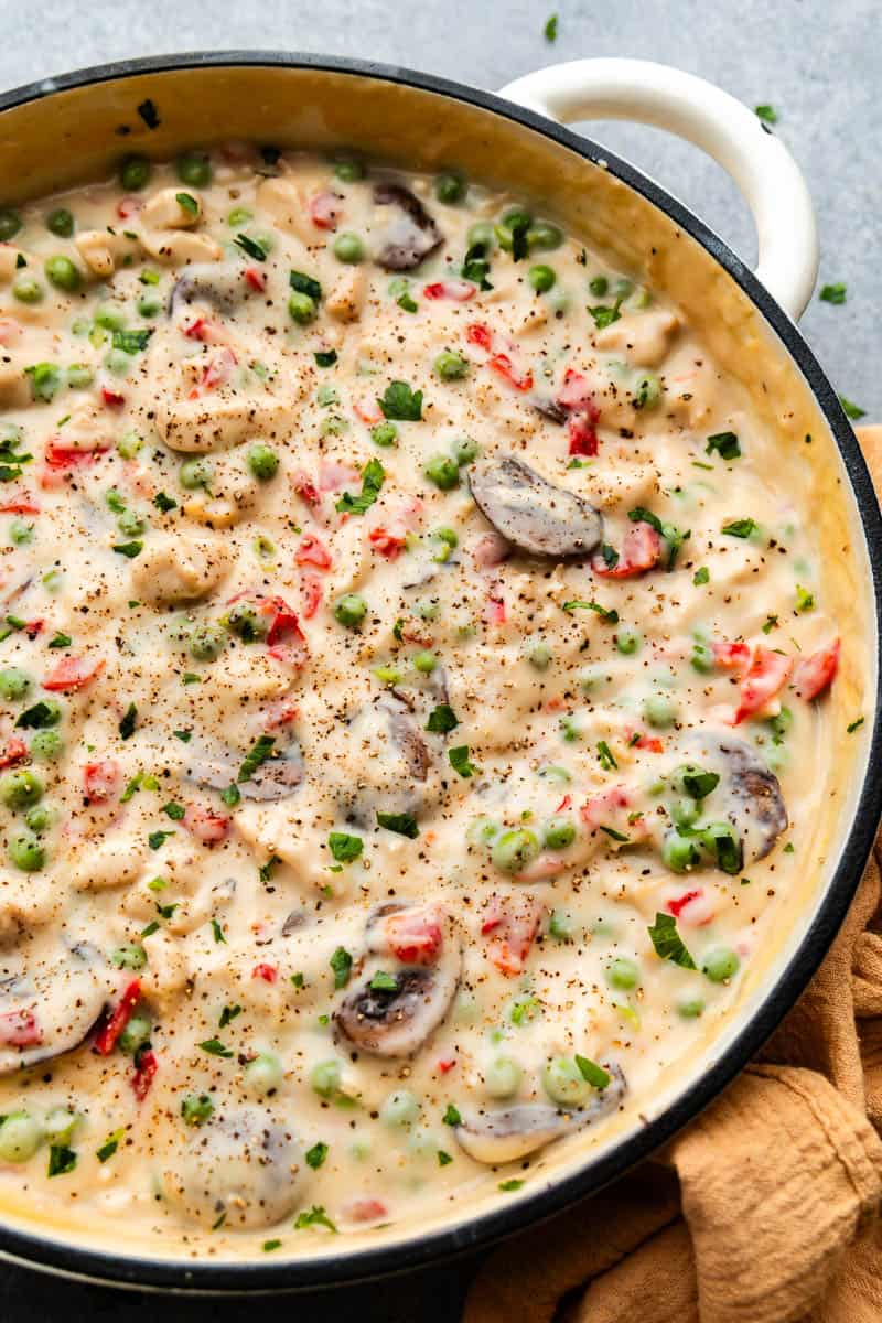 A large skillet of classic chicken a la king is ready to serve