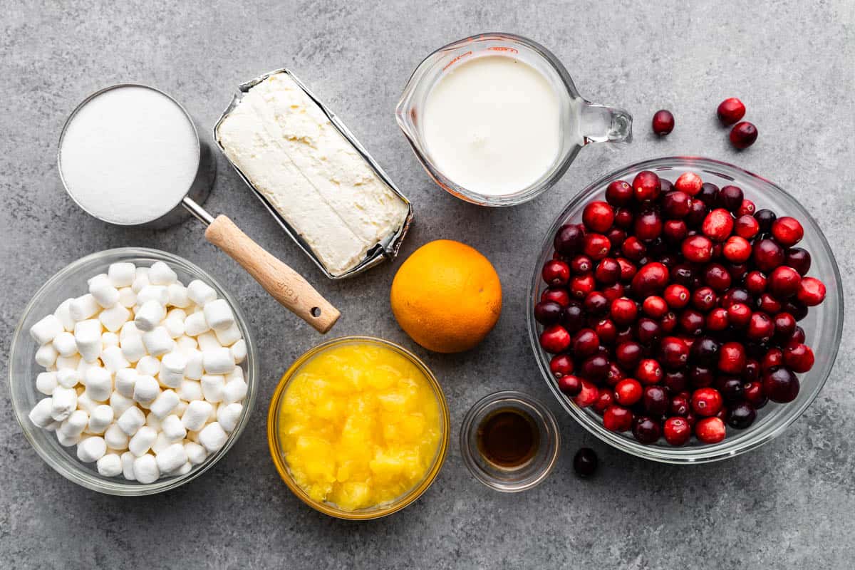 Bowl of cranberry fluff ingredients on charcoal background