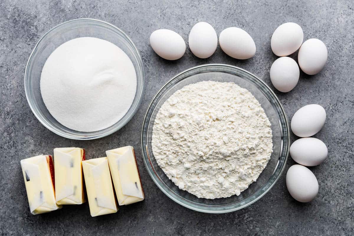 Cake ingredients in bowls on kitchen counter