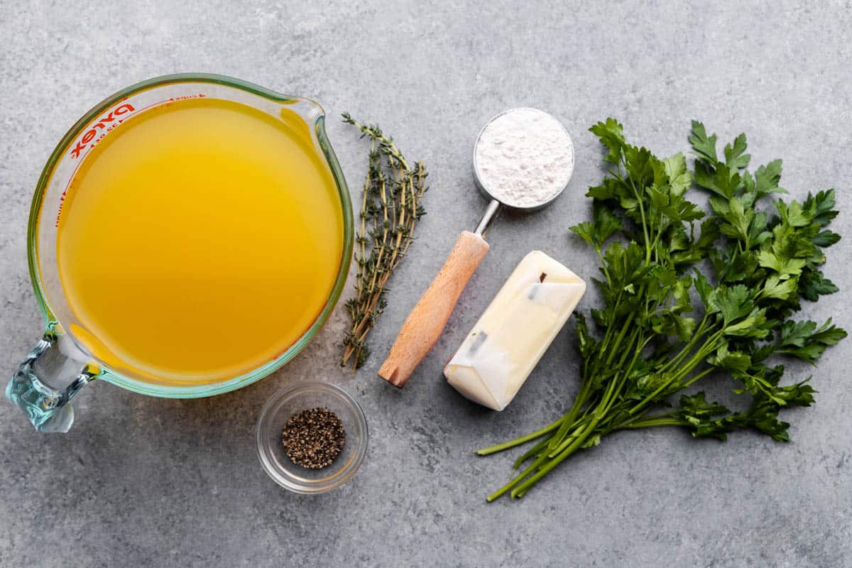 An overhead view of the ingredients needed to make turkey gravy.