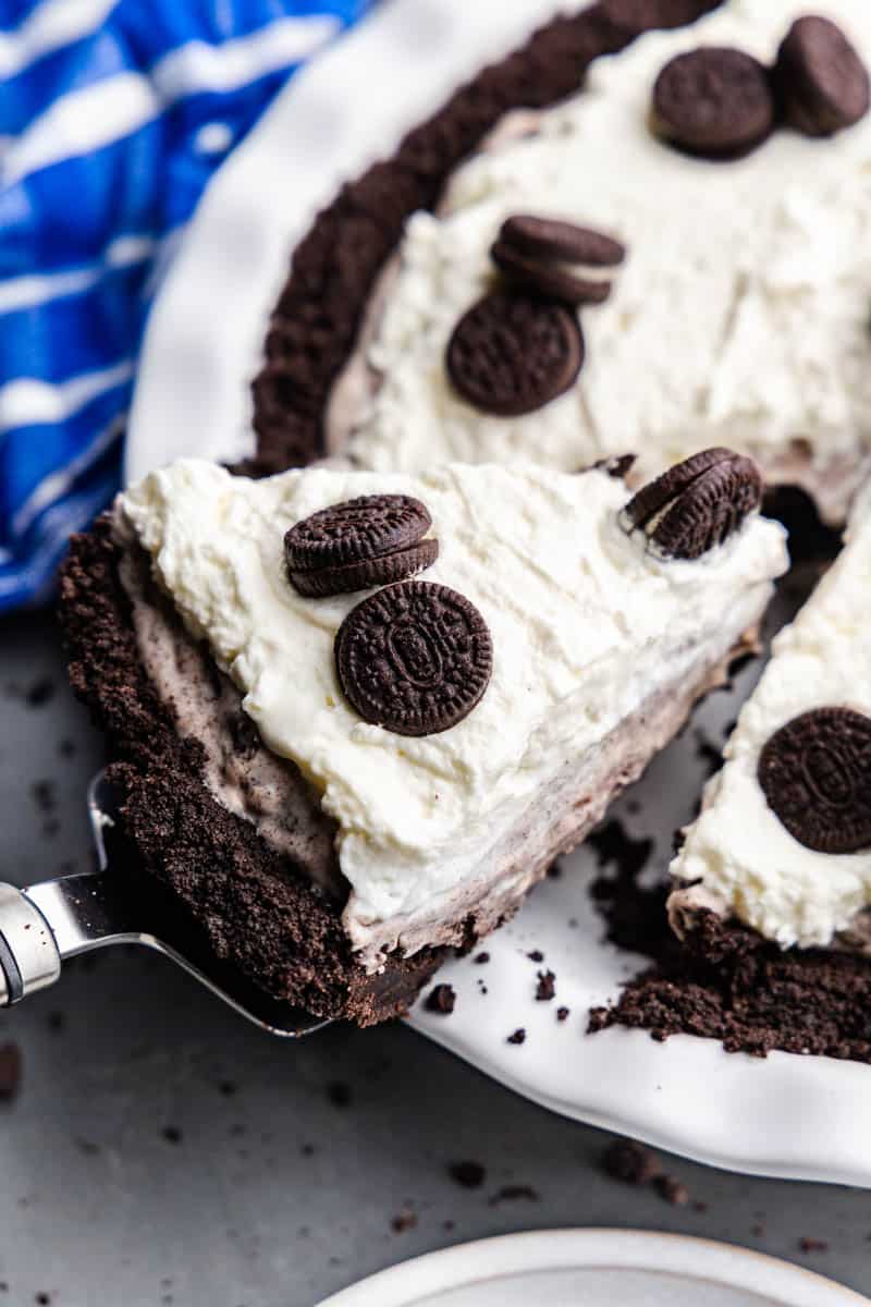 pie slice holding a piece of oreo pie