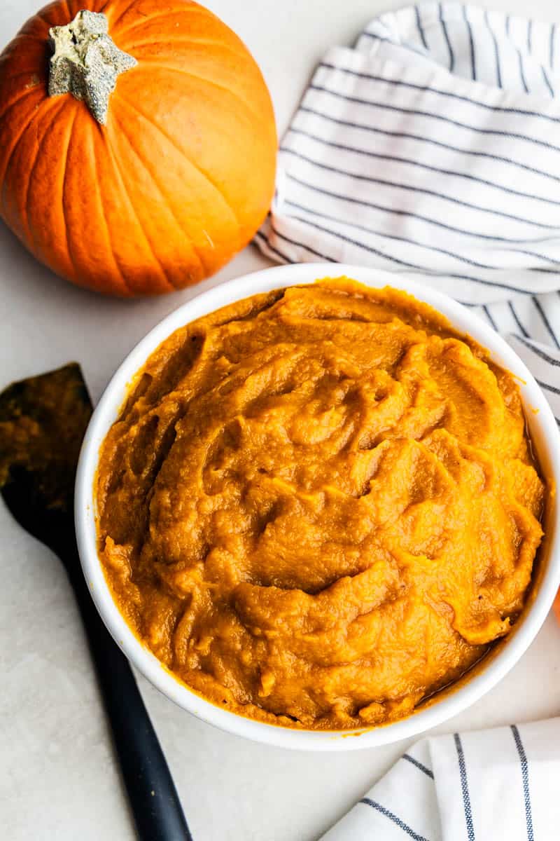 An overhead view of a bowl of homemade pumpkin puree.