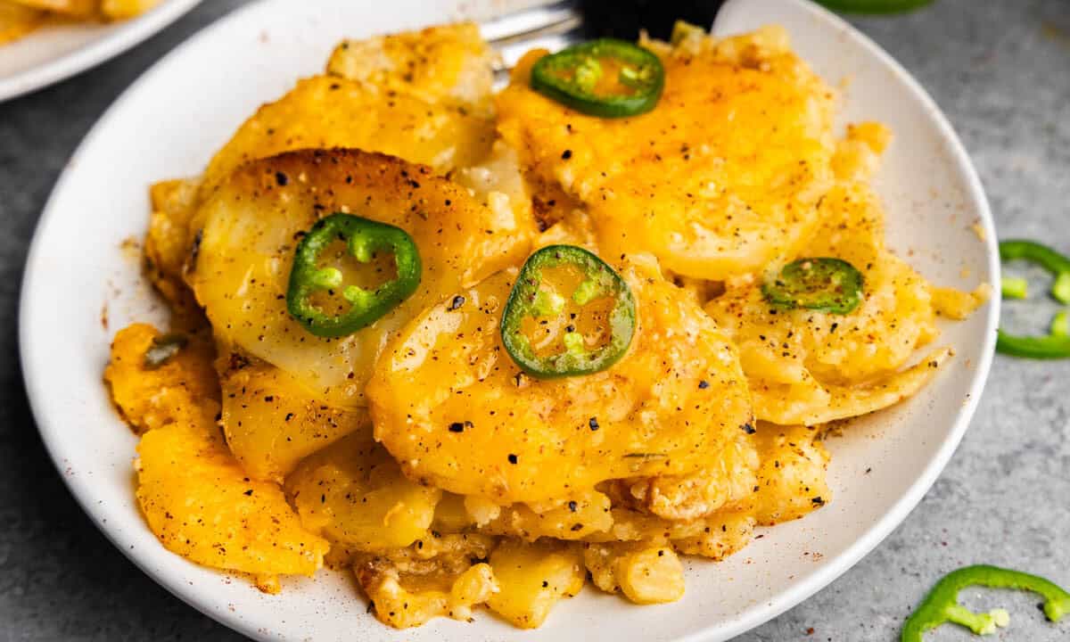 A plate of cheesy jalapeno scalloped potatoes.