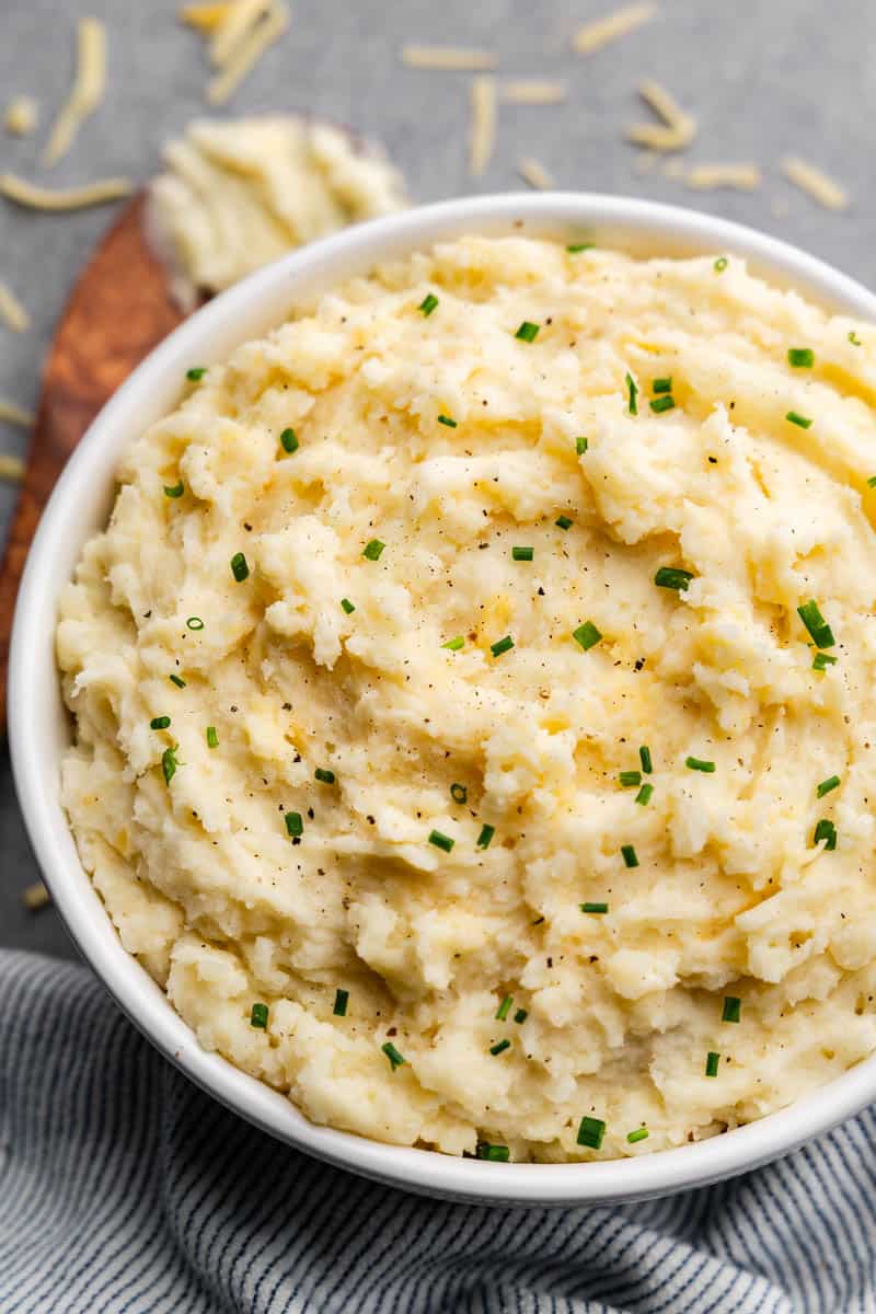 homemade smoked gouda mashed potatoes in large white bowl