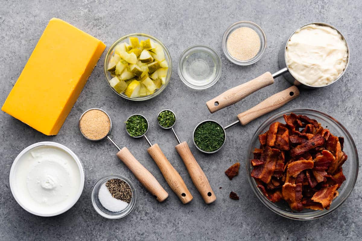 bacon wrapped pickle dip ingredients on table