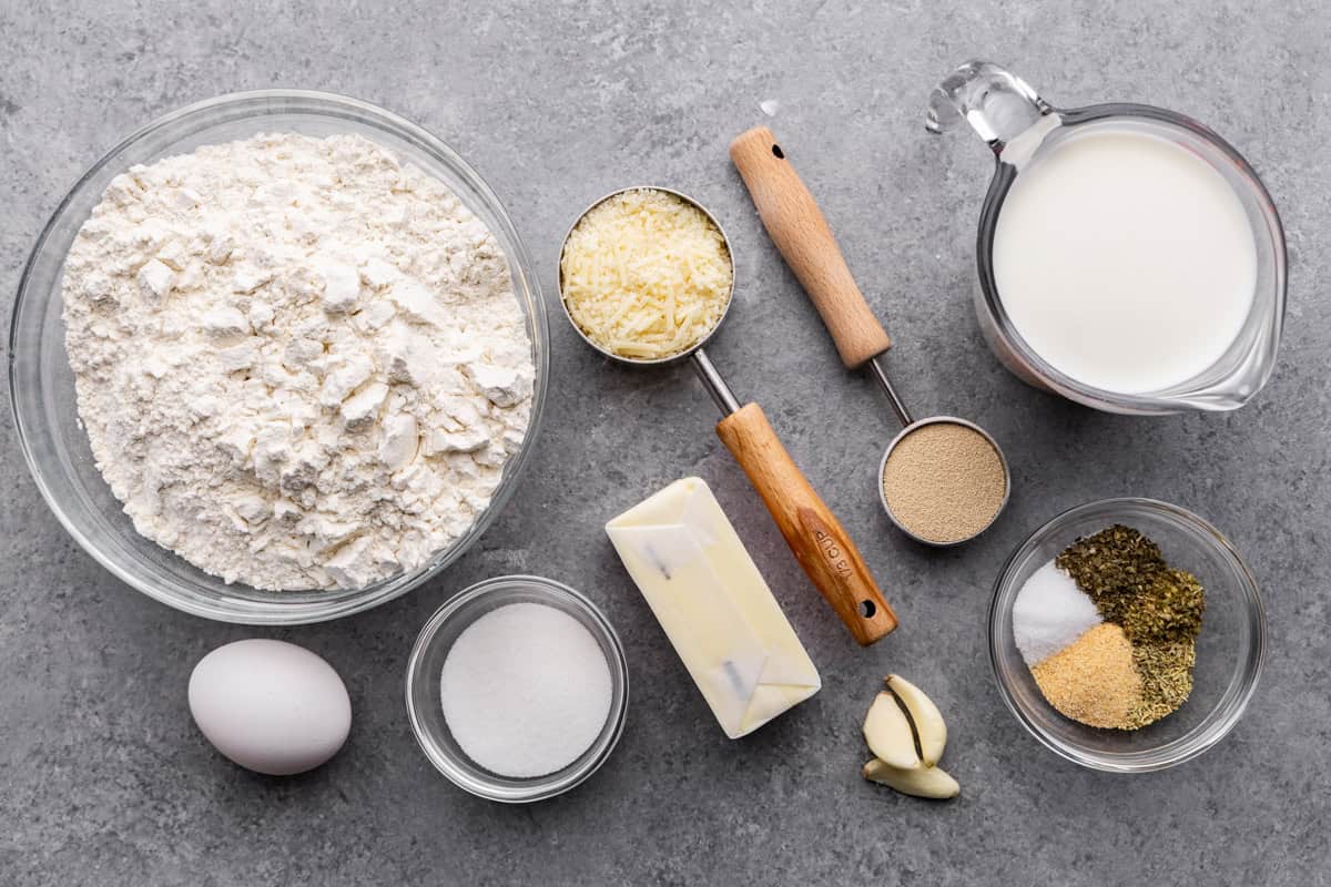 garlic parmesan herb dinner roll ingredients on table