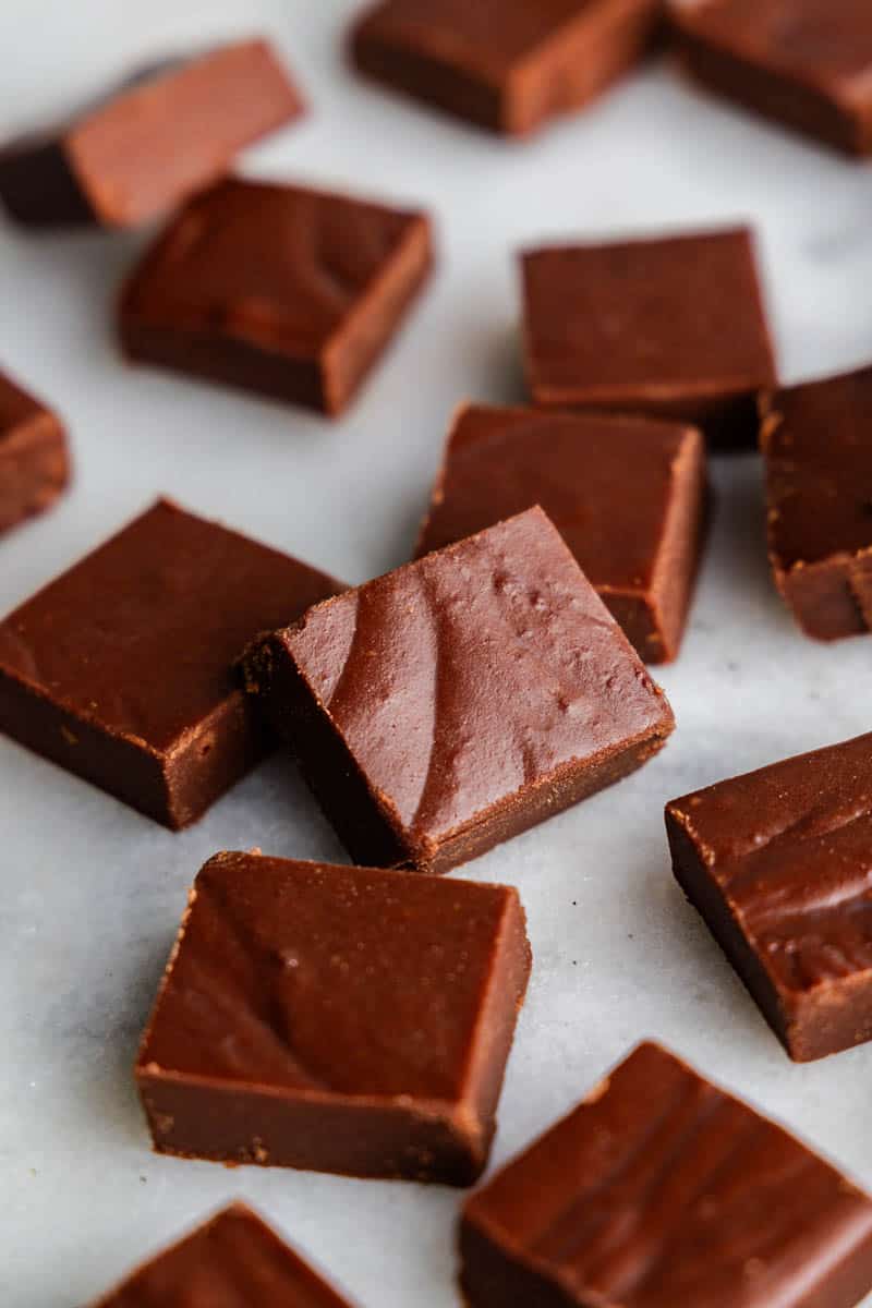 An overhead view of pieces of homemade fudge on a table.