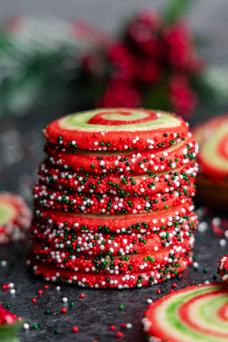 spiral christmas sugar cookies stacked on table