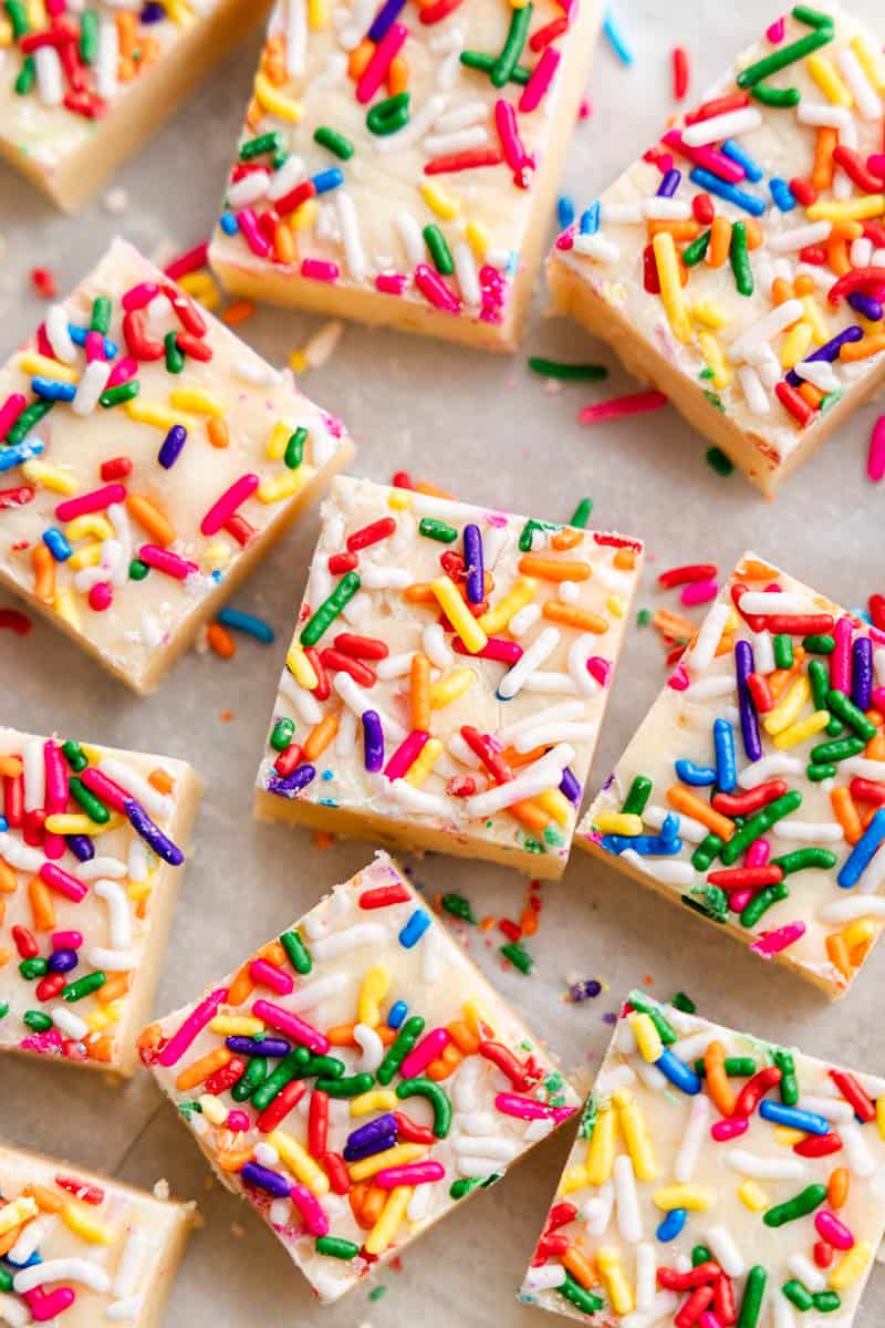 an overhead view of pieces of sugar cookie fudge on a table