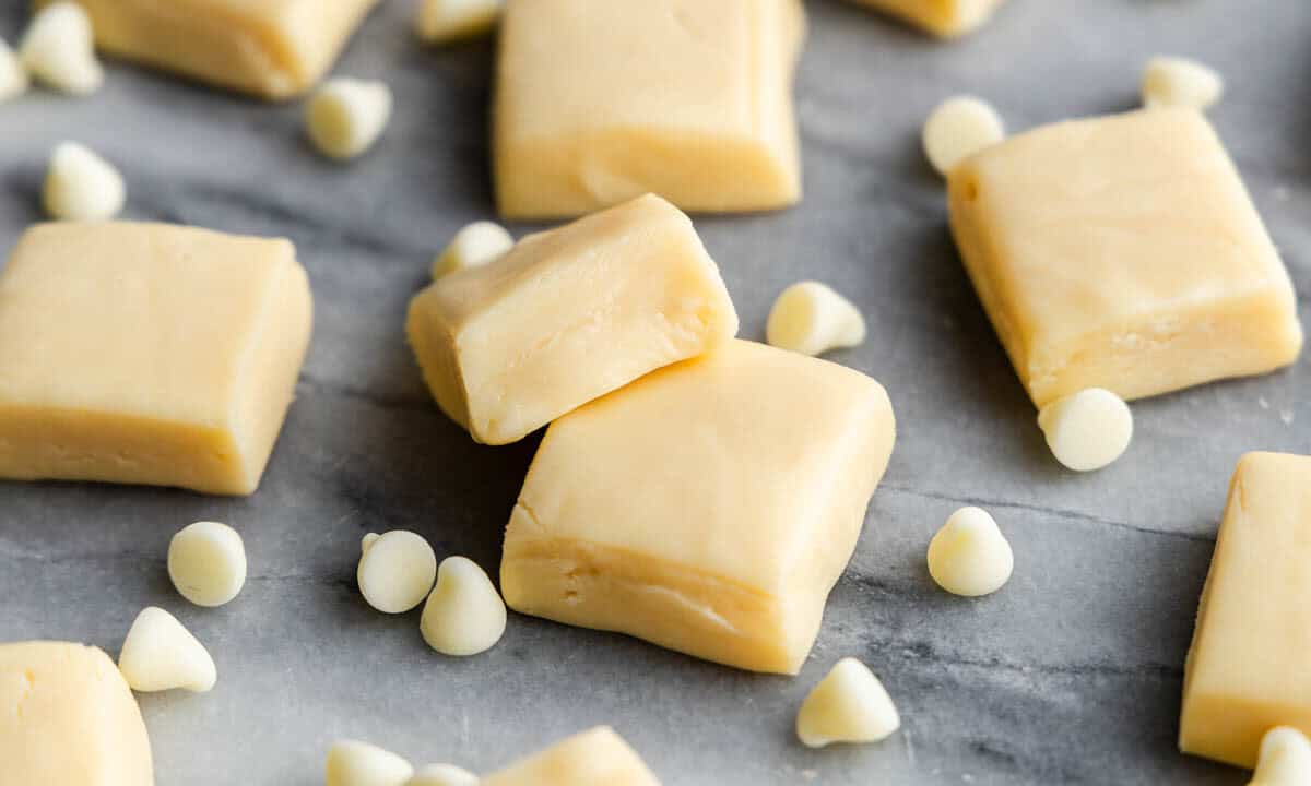 Pieces of vanilla fudge on a marble counter.