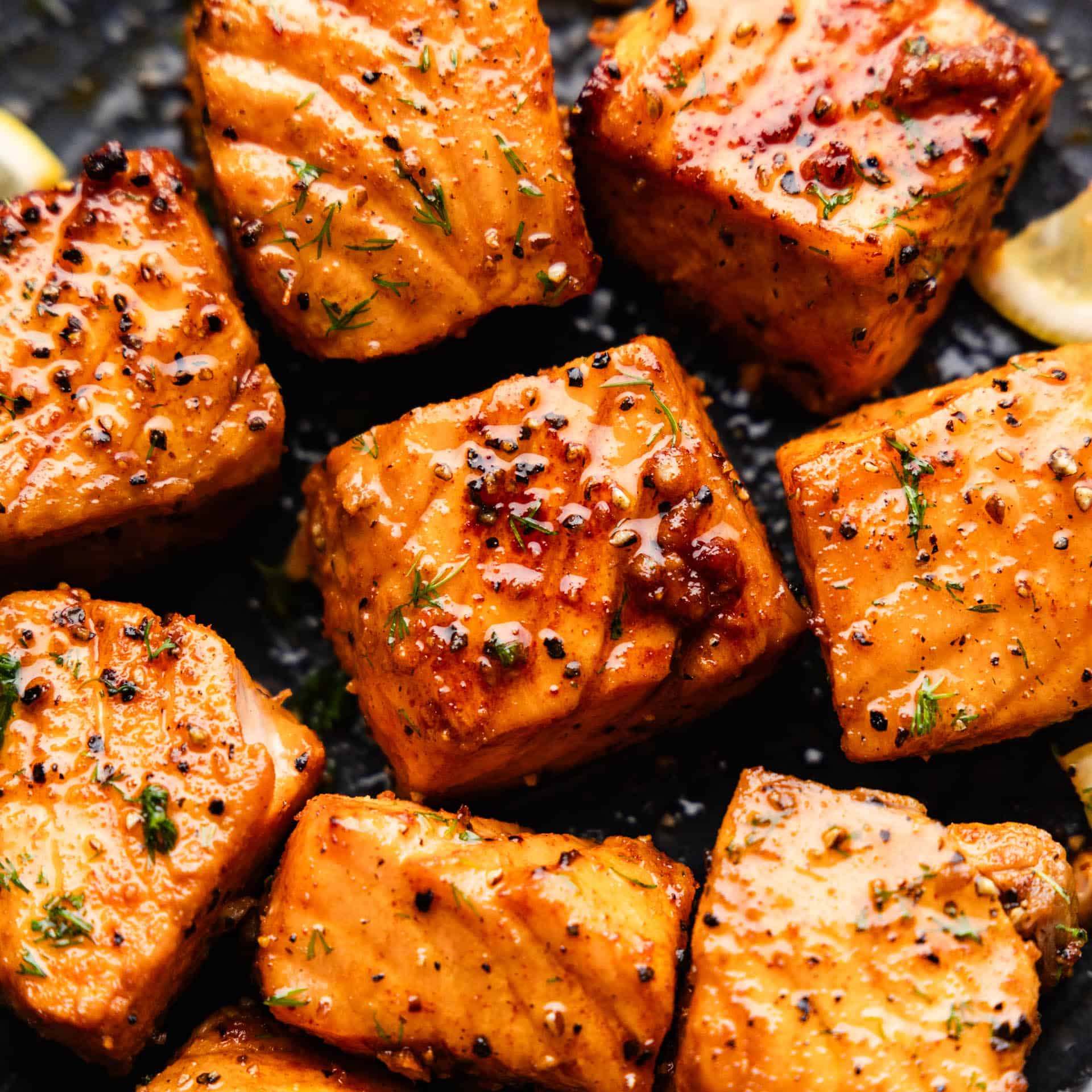 A macro view of salmon bites made in the air fryer.