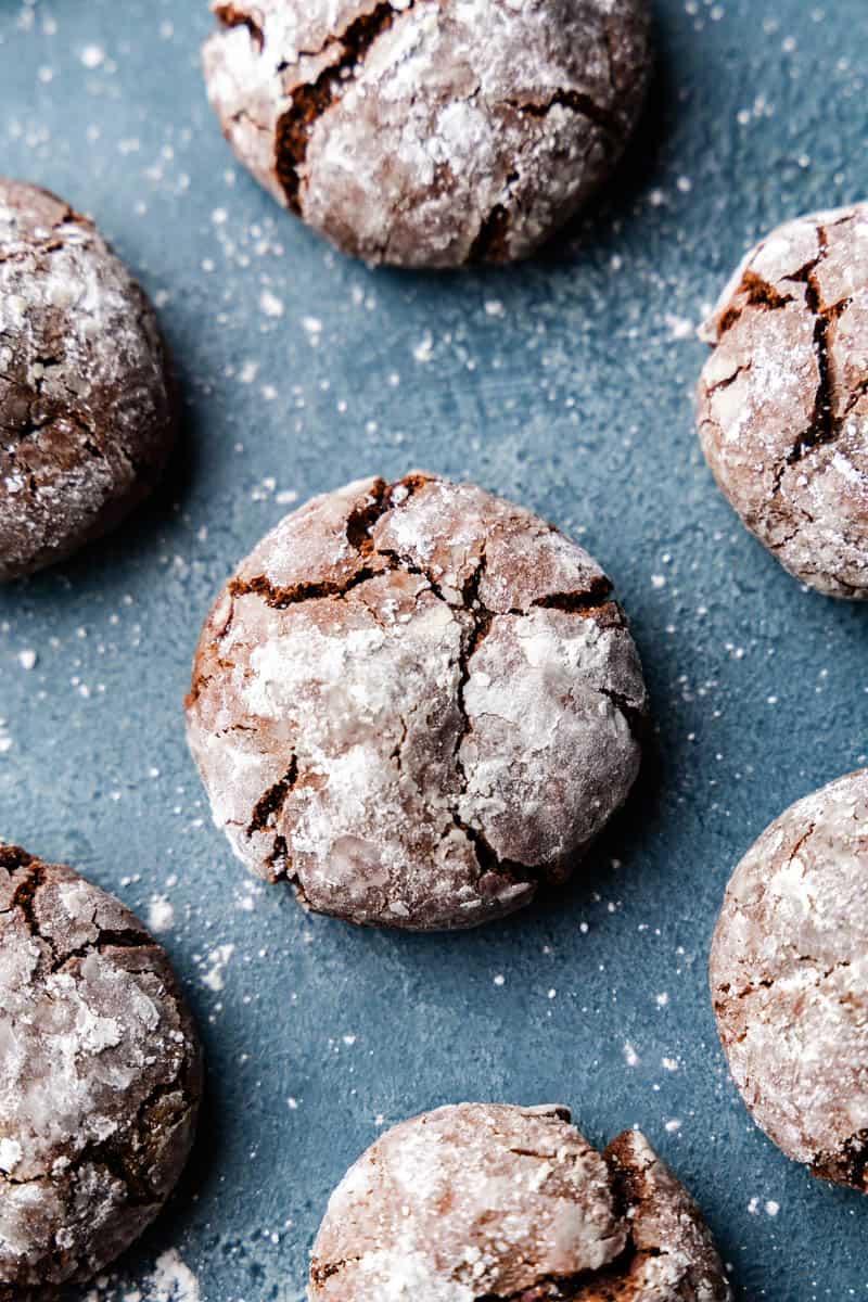 An overhead view of chocolate crinkle cookies.