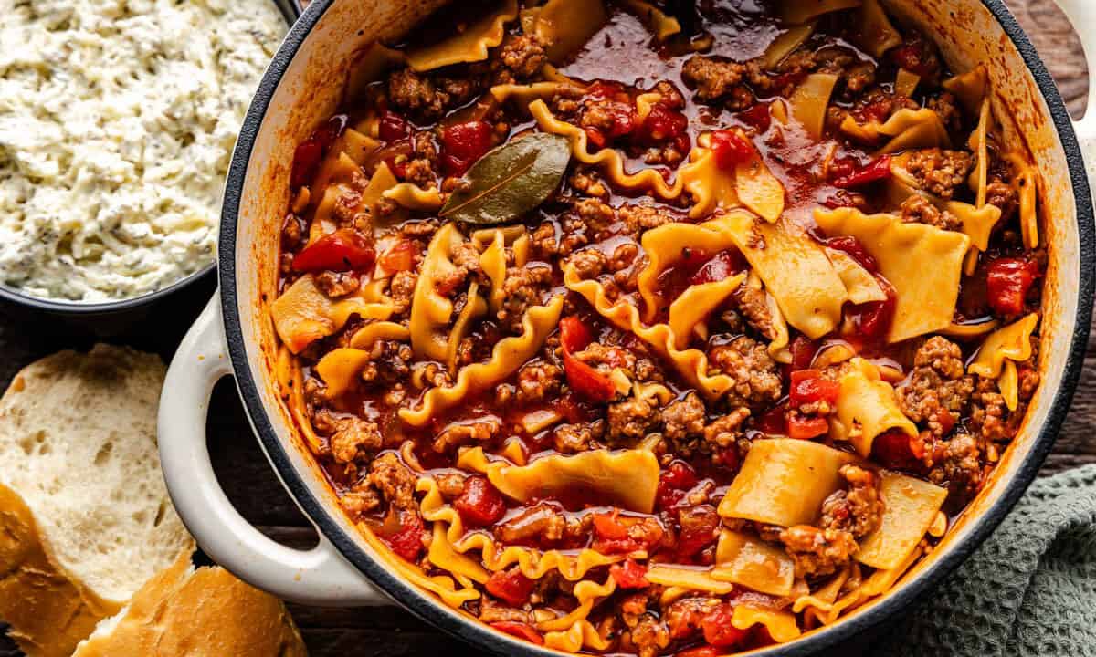 An overhead view of a pot of homemade lasagna soup.