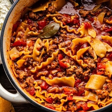 An overhead view of a pot of homemade lasagna soup.