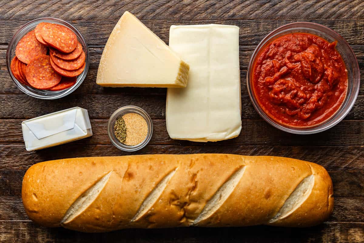 An overhead shot of ingredients for Air Fryer French Bread Pizza