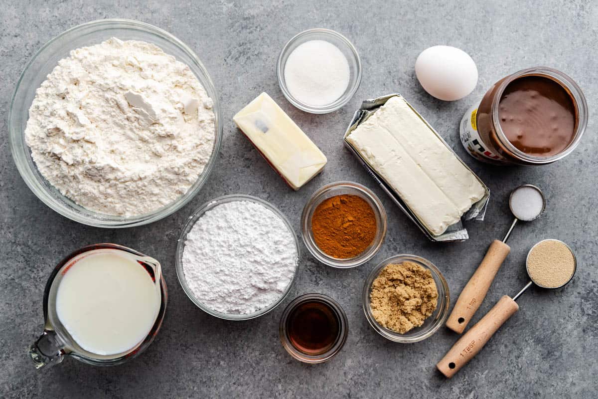 An overhead view of the ingredients needed to make Nutella cinnamon rolls.