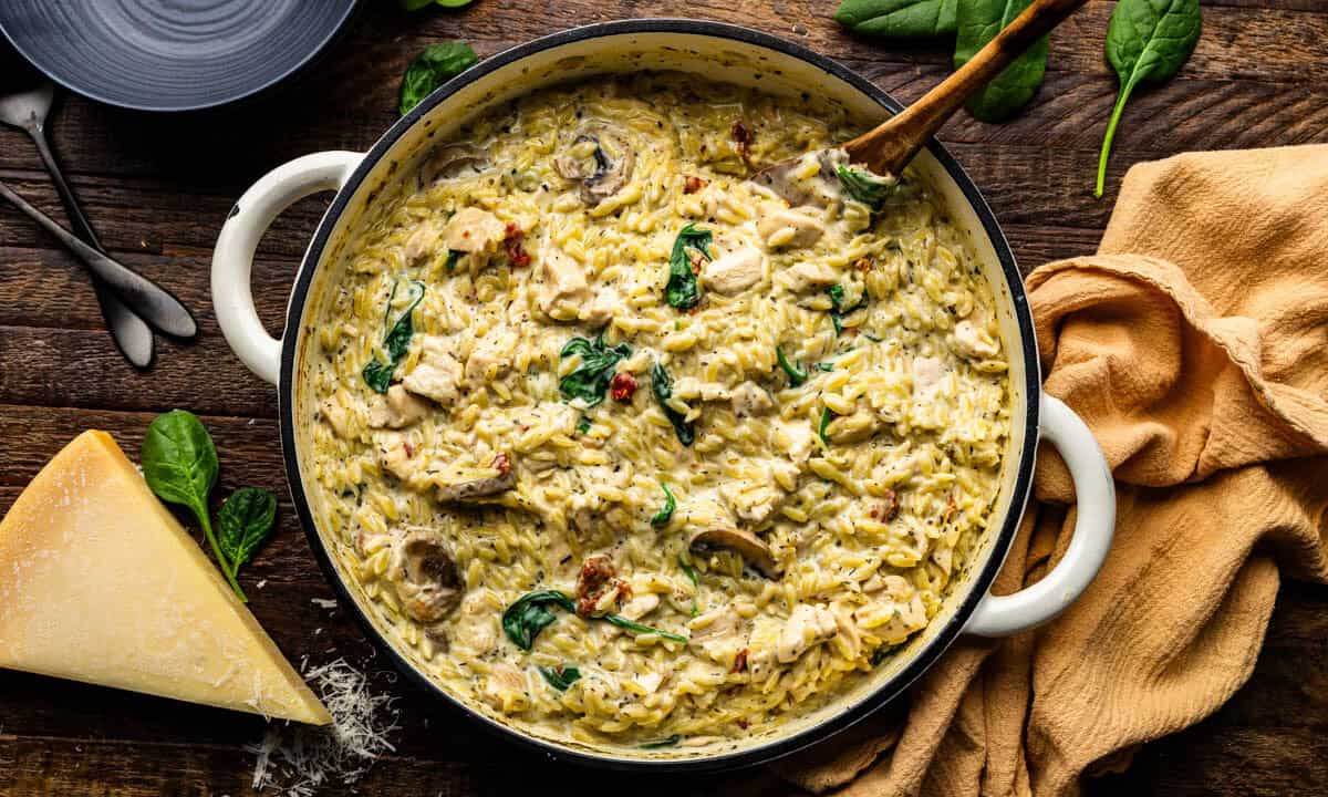 An overhead view of a pot of italian pasta orzo