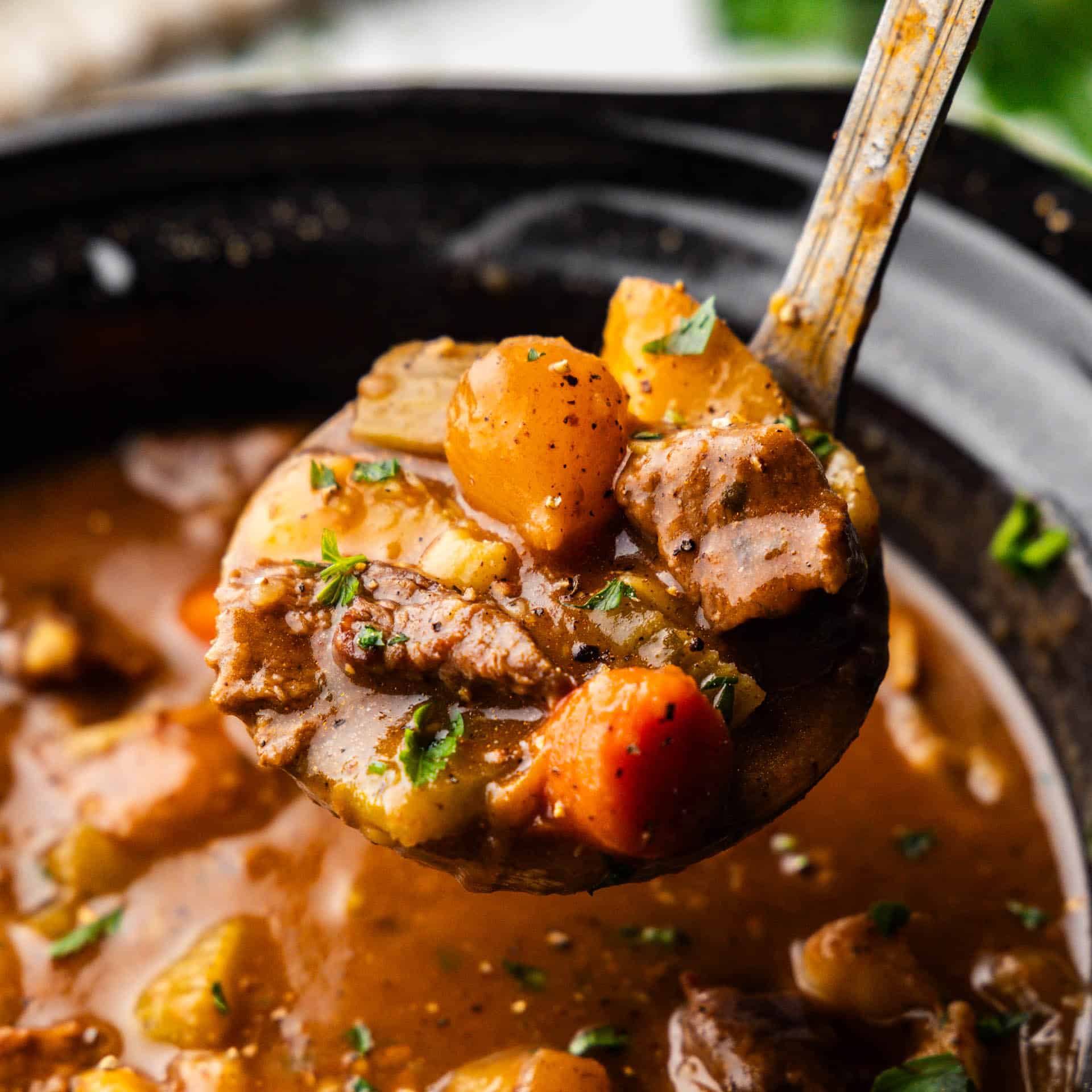 ladle full of slow cooker beef stew