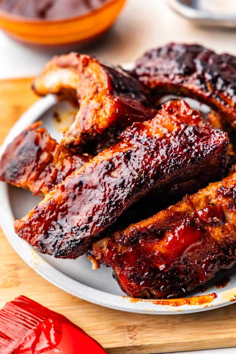 A close up view of a pile of pork ribs made in the crockpot.