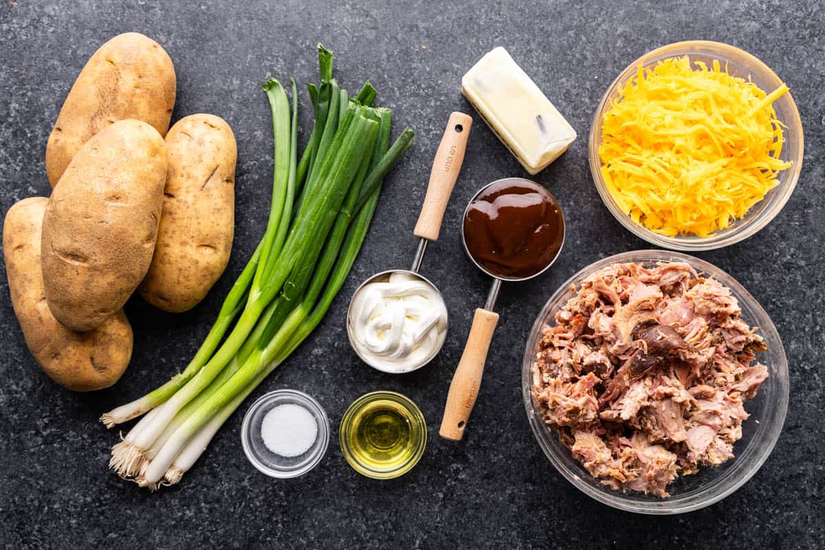 An overhead shot of ingredients for Pulled Pork Loaded Potato.