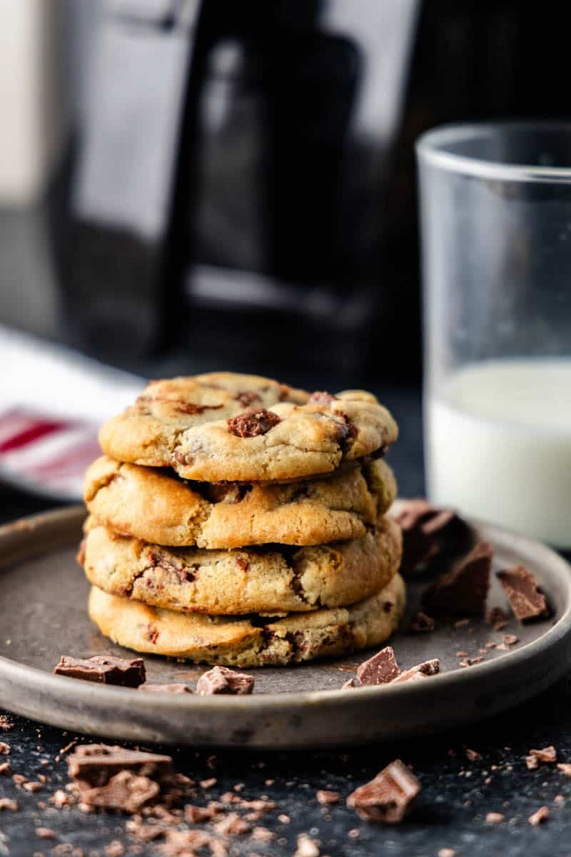 Chocolate chip air fryer cookies stacked on plate.