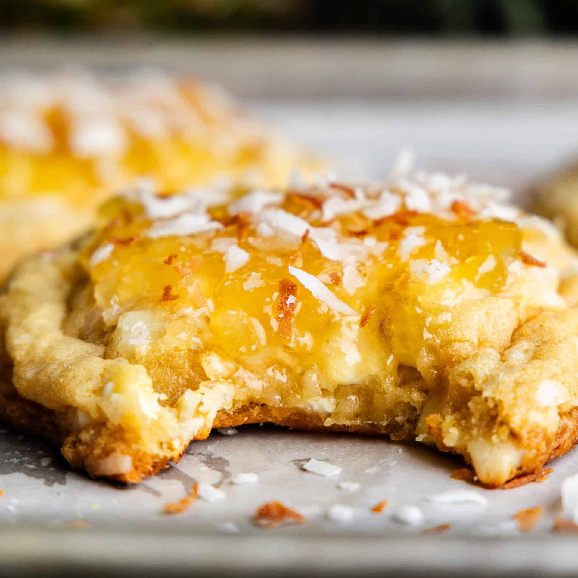 Bite shot of Bakery Style Pina Colada Cookie.