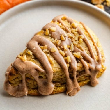 One Carrot Cake Scone on a white plate.