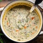 Shot of Creamy Vegetable Soup in large pot.