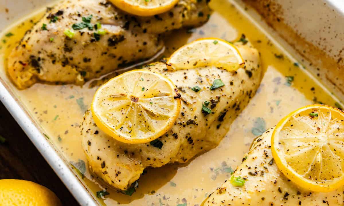 Lemon Herb Baked Chicken Breasts in casserole dish.