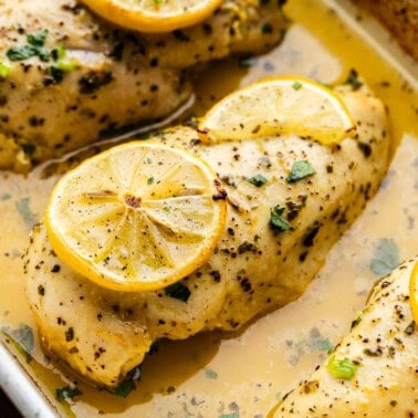 Lemon Herb Baked Chicken Breasts in casserole dish.