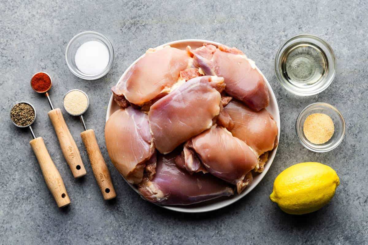 Overhead shot of the ingredients for Sheet Pan Boneless Skinless Chicken Thighs.