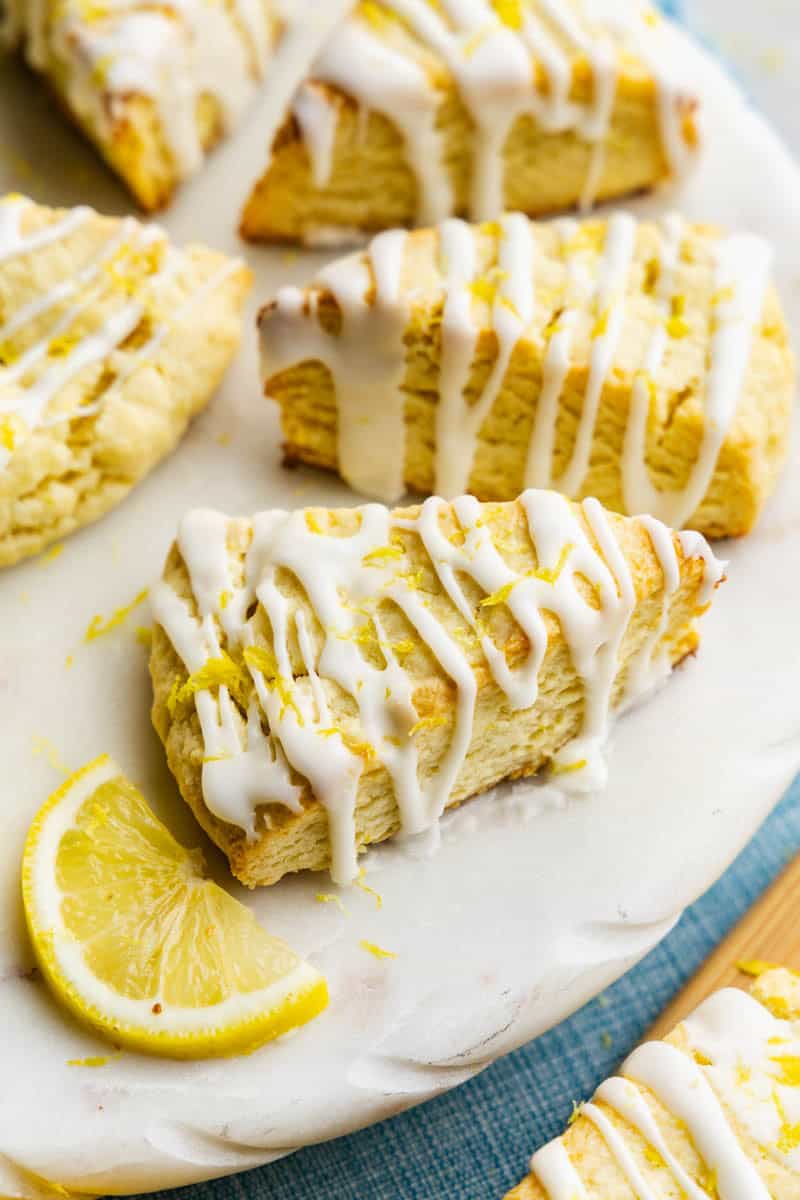 Closeup of a Lemon Scone on a marble platter.