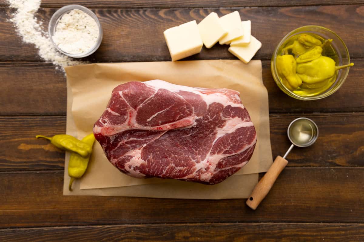 An overhead view of the ingredients needed to make Mississippi Pork Roast.