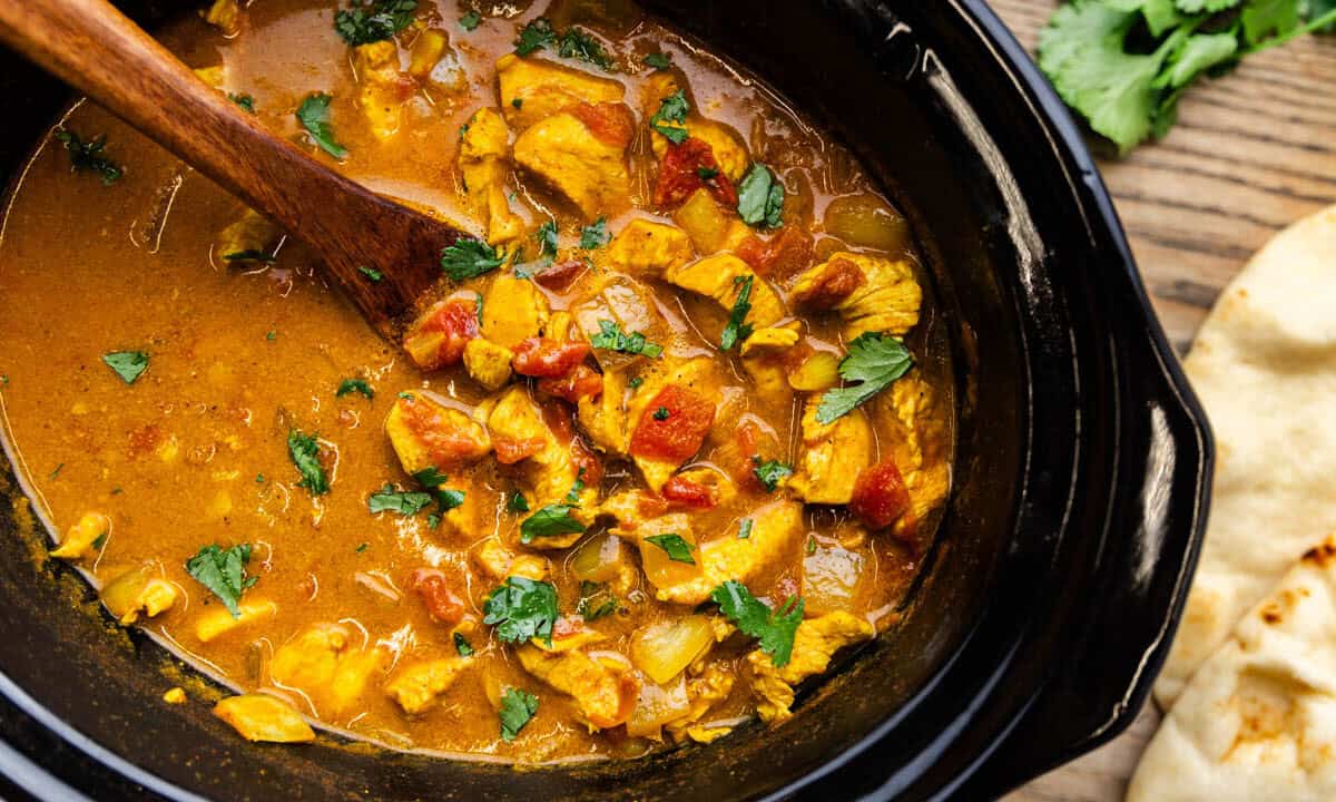 Overhead of Coconut Chicken Curry in slow cooker.