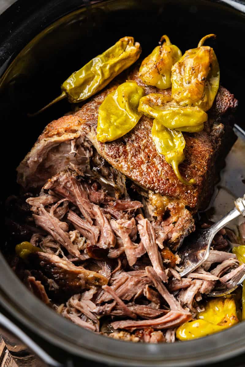 Mississippi Pork Roast shredded in slow cooker.